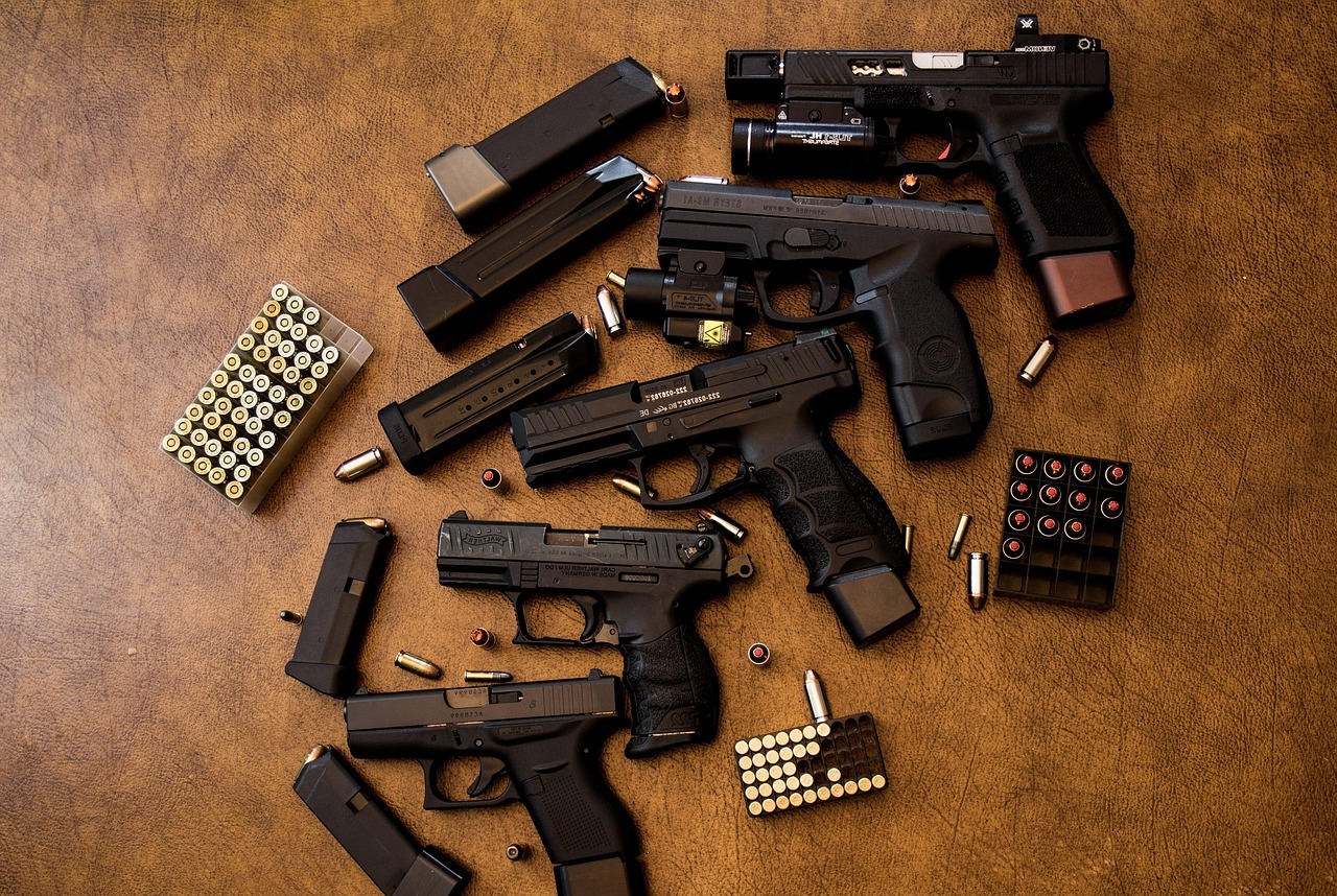 Arrangement of firearms, magazines, and ammunition